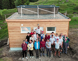 The finished sanitary block with the participants of the project.